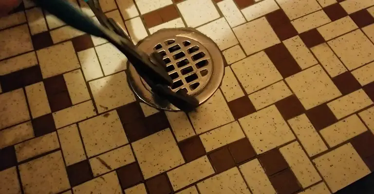 How to Remove Shower Drain Cover