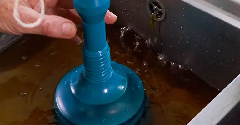 Remove Blockage by Plunger